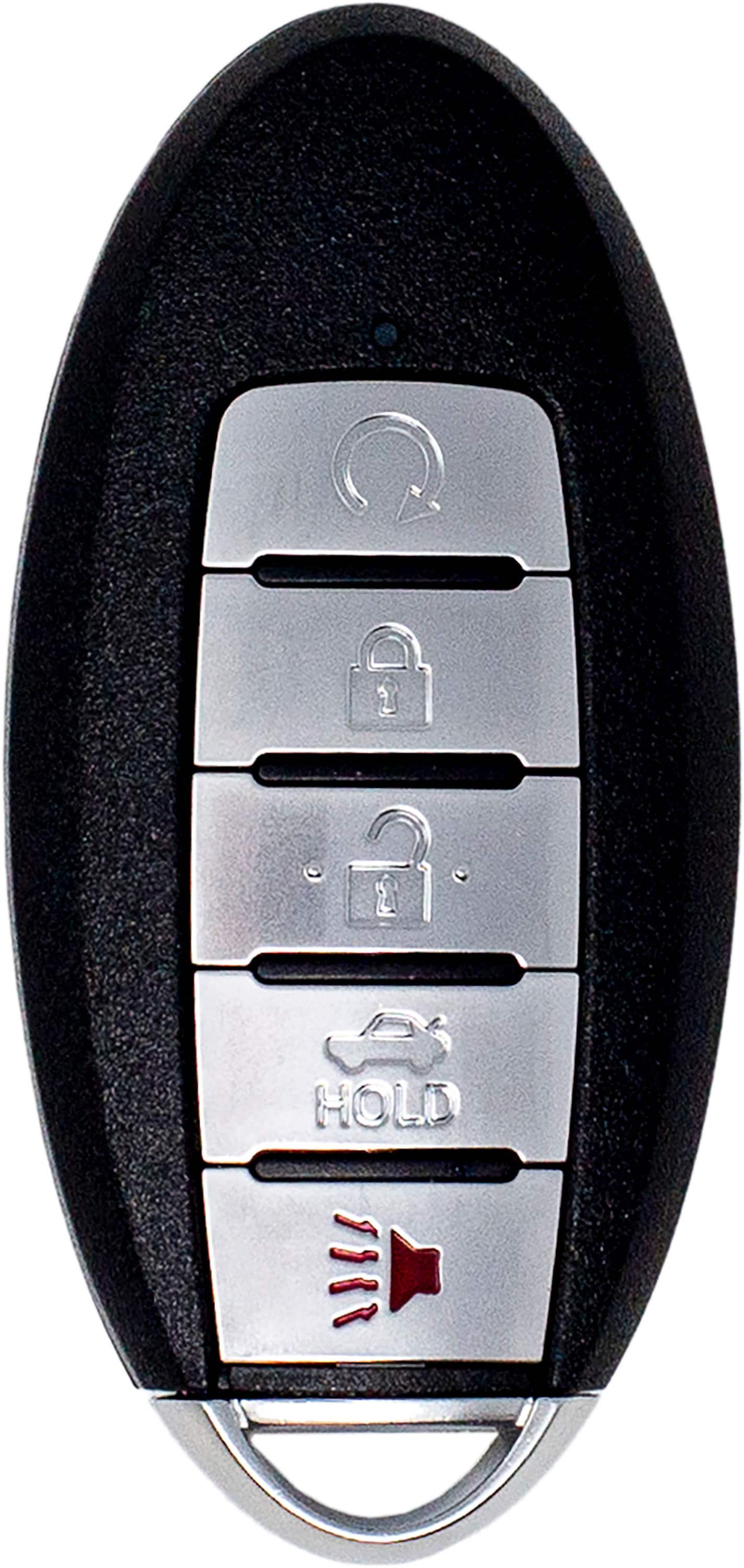 Close‑up of the Car Keys Express Nissan Smart Key remote and programming device on a workbench